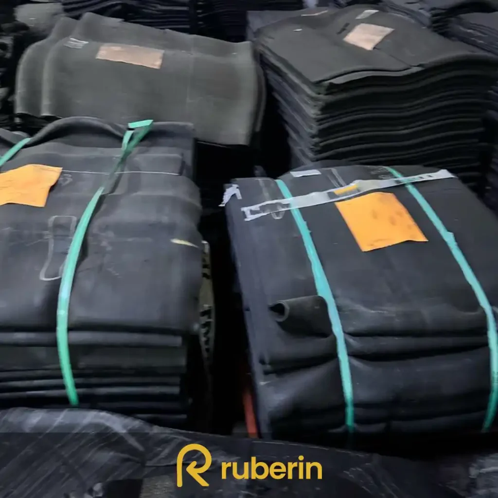 Pre-processed rubber compounds stacked in bundles, ready for secondary processing or rubber product manufacturing.